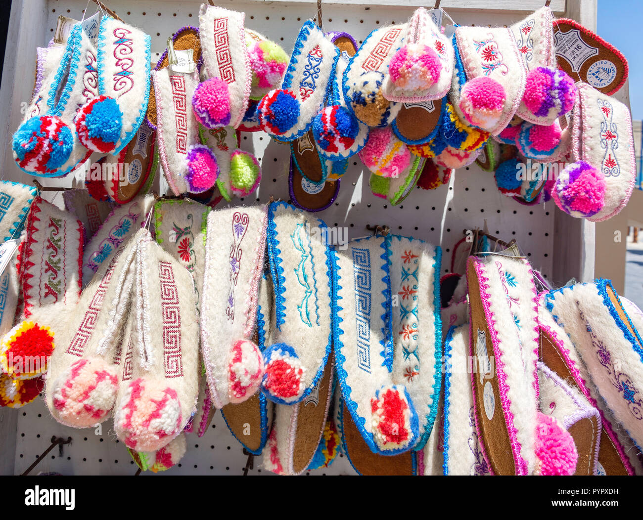 Greek traditional woollen slippers for sale, Avgoustou 17 Street, Heraklion (Irakleio), Irakleio Region, Crete (Kriti), Greece Stock Photo