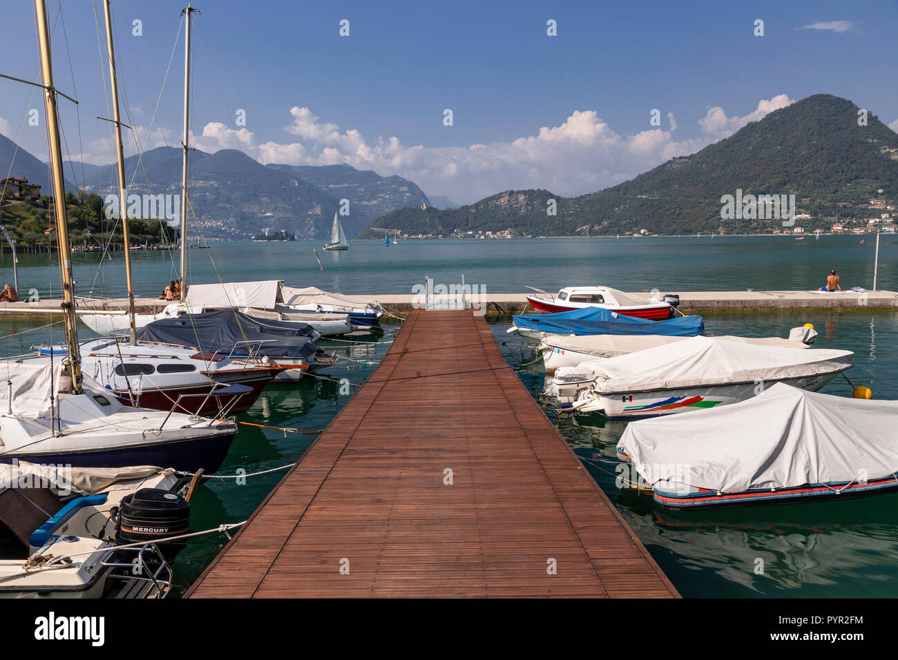 Boats moored on Lake Iseo in northern Italy Stock Photo