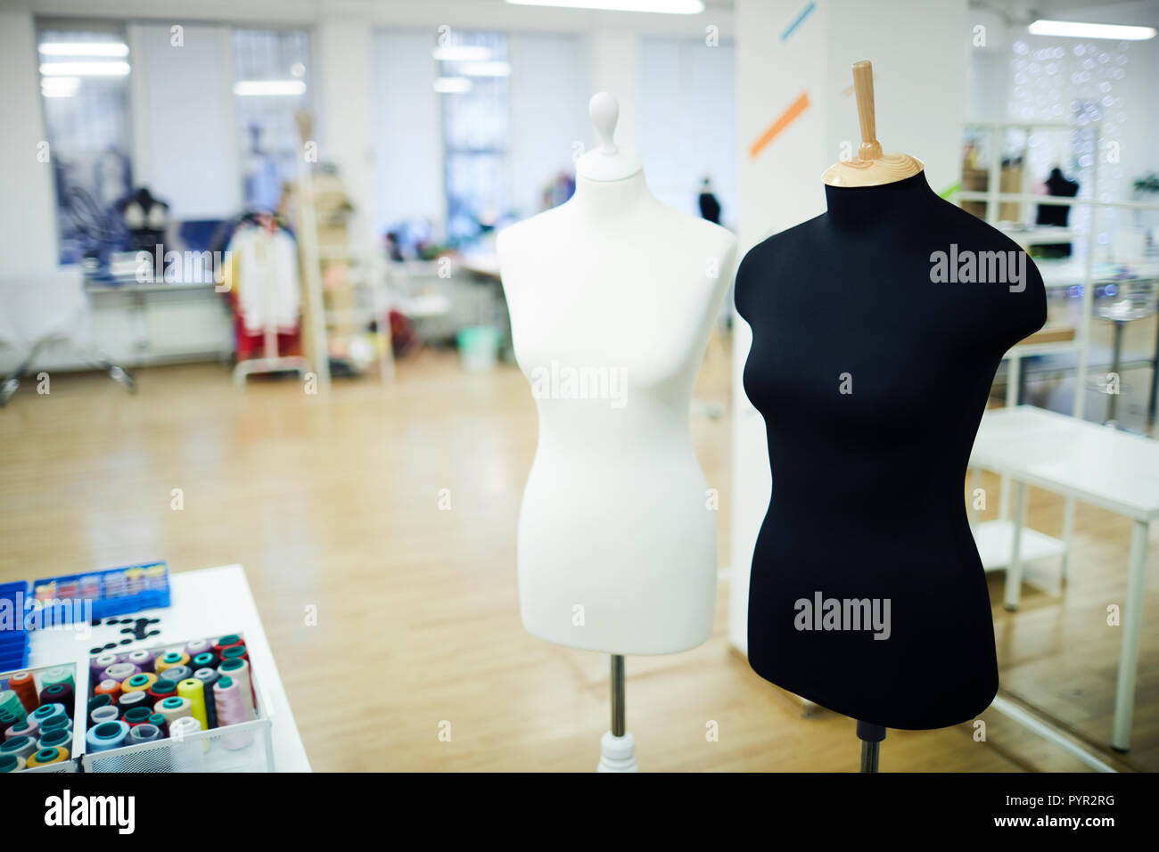 Black and white mannequins in fashion studio Stock Photo