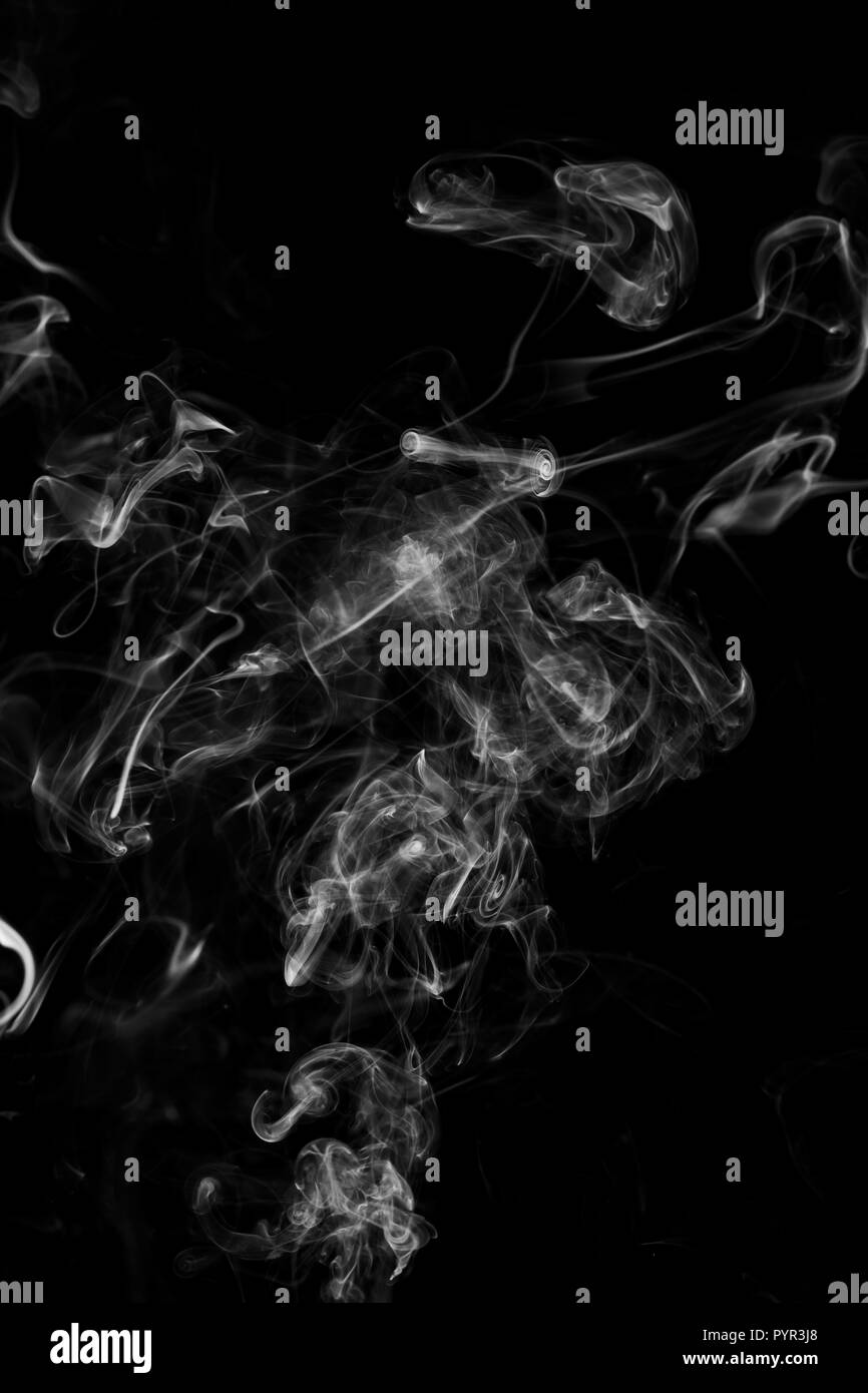 The abstract figure of the smoke on a black background Stock Photo - Alamy