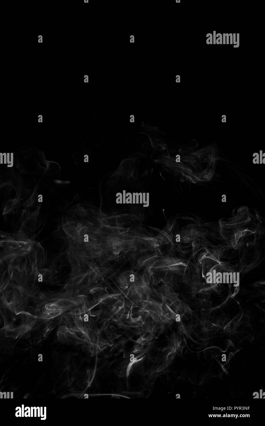 The abstract figure of the smoke on a black background Stock Photo - Alamy