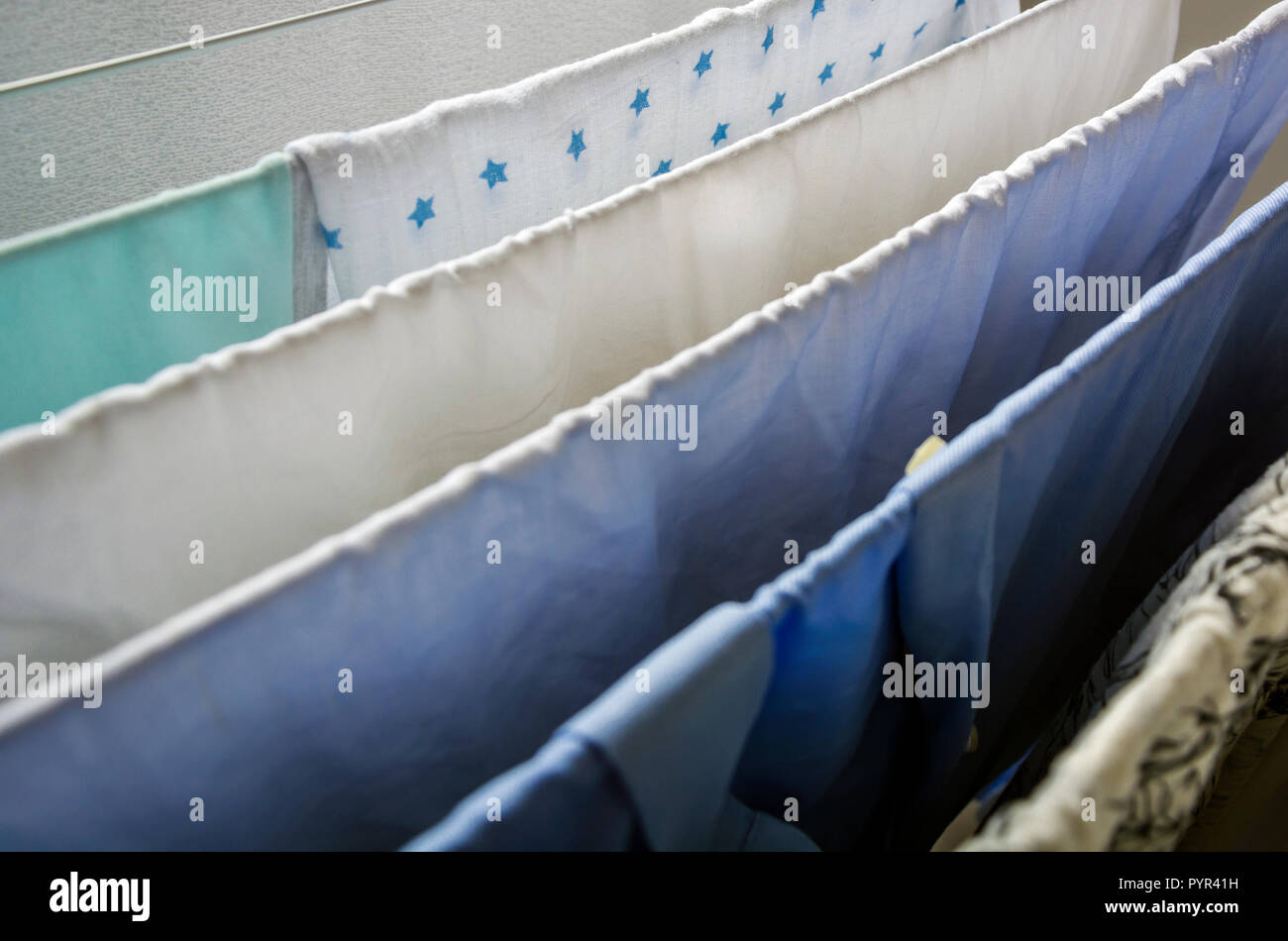 Laundry drying on a clotheshorse with star shaped decorated fabric in focus Stock Photo Alamy