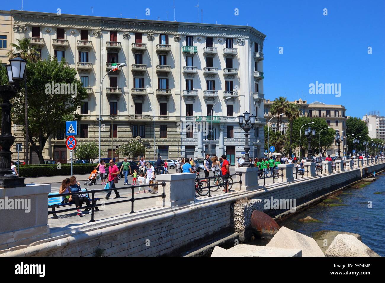 BARI, ITALY - MAY 28, 2017: People visit Lungomare boulevard in Bari, Italy. Bari is the capital city of the Apulia region. It has 326,799 inhabitants Stock Photo
