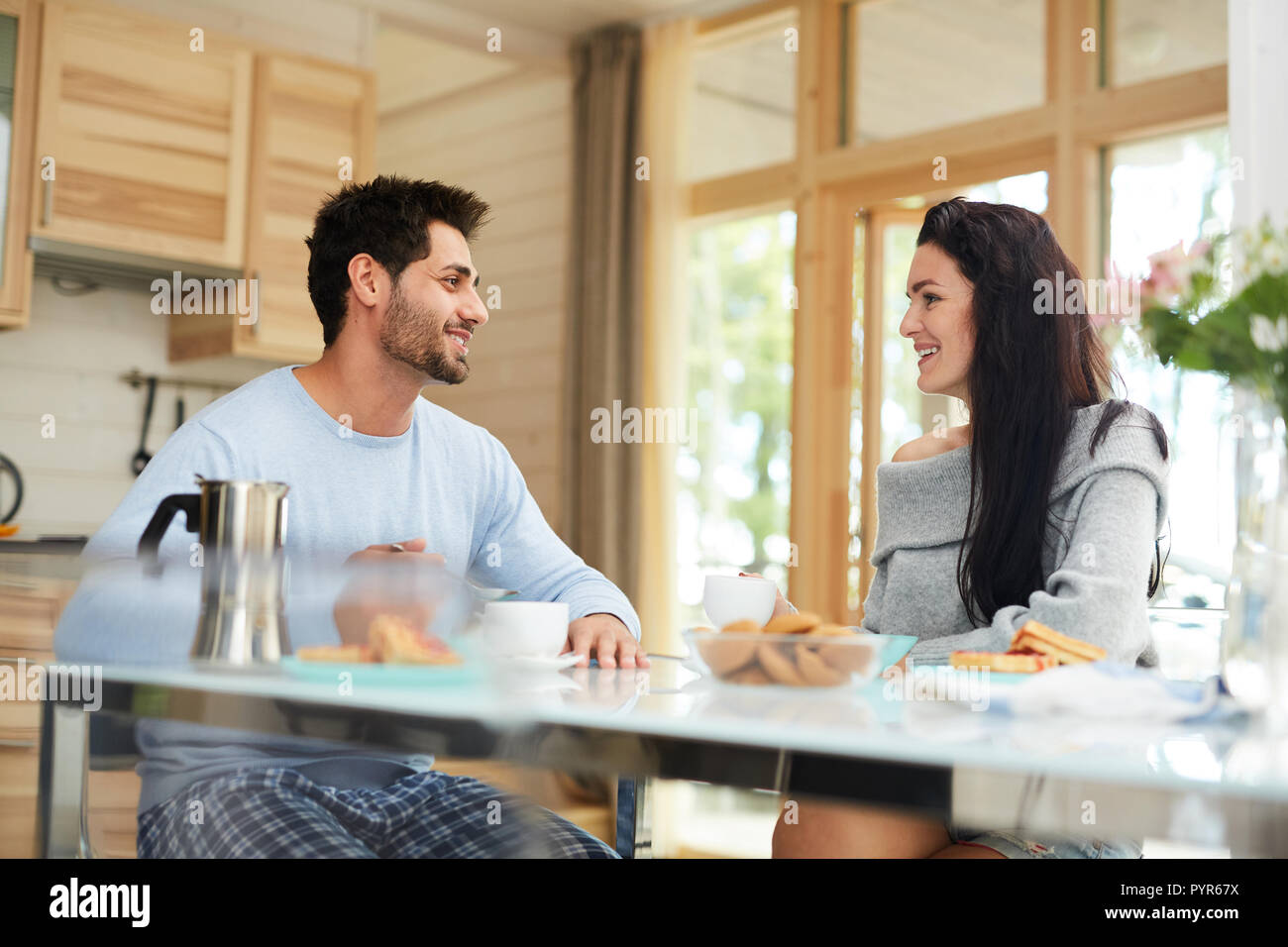 Happy couple having breakfast together Stock Photo