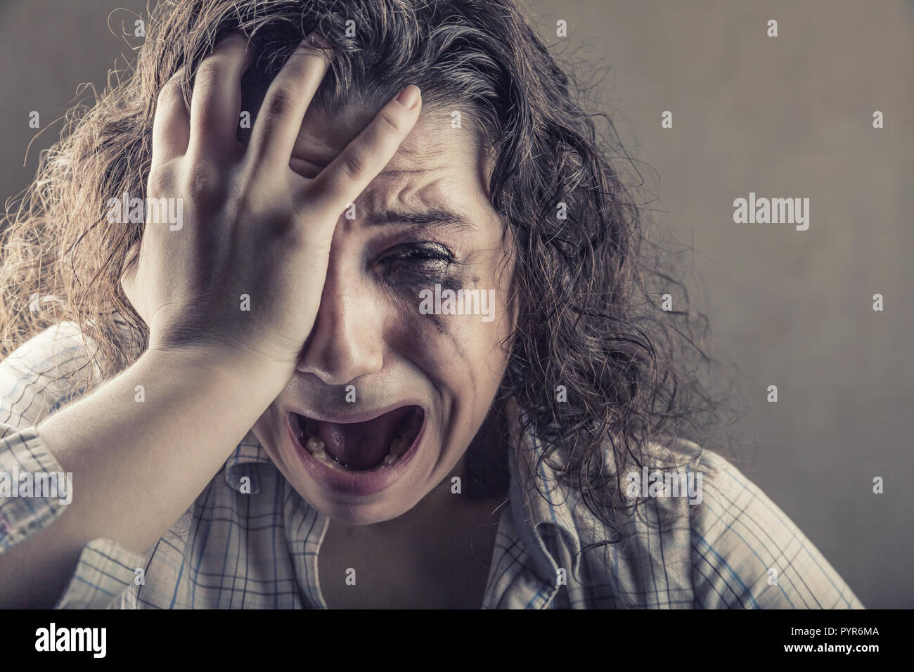 Crying girl. Closeup of a young woman desperately crying Stock ...