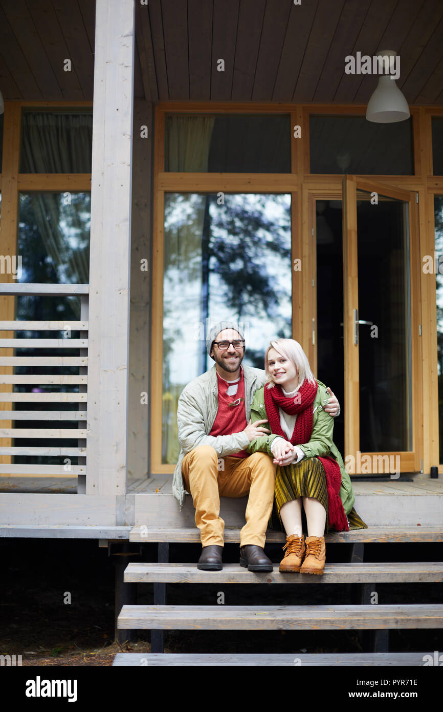 Amorous Couple On House Porch Stock Photo