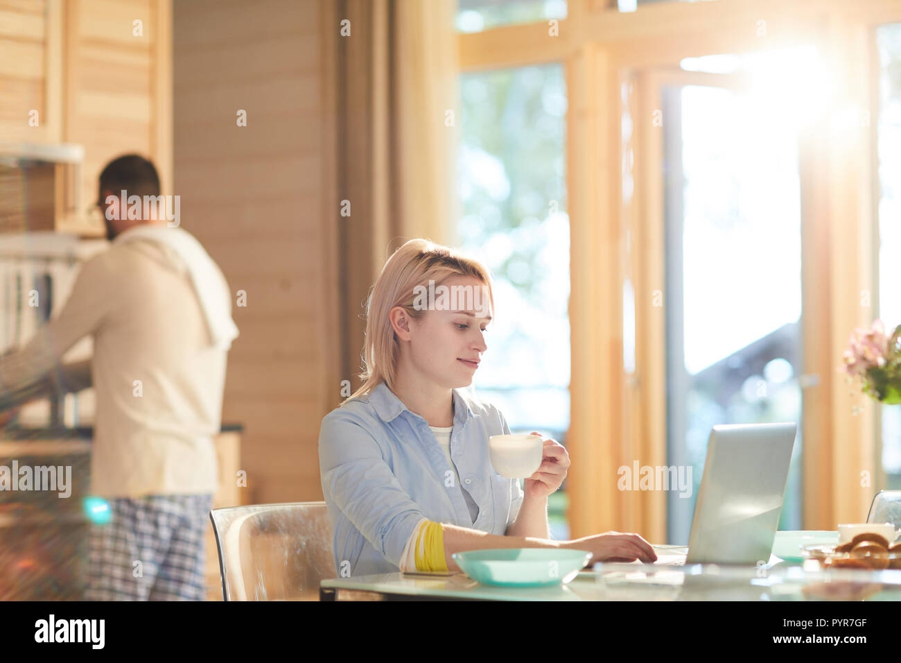 Beautiful woman using laptop reading hi-res stock photography and ...