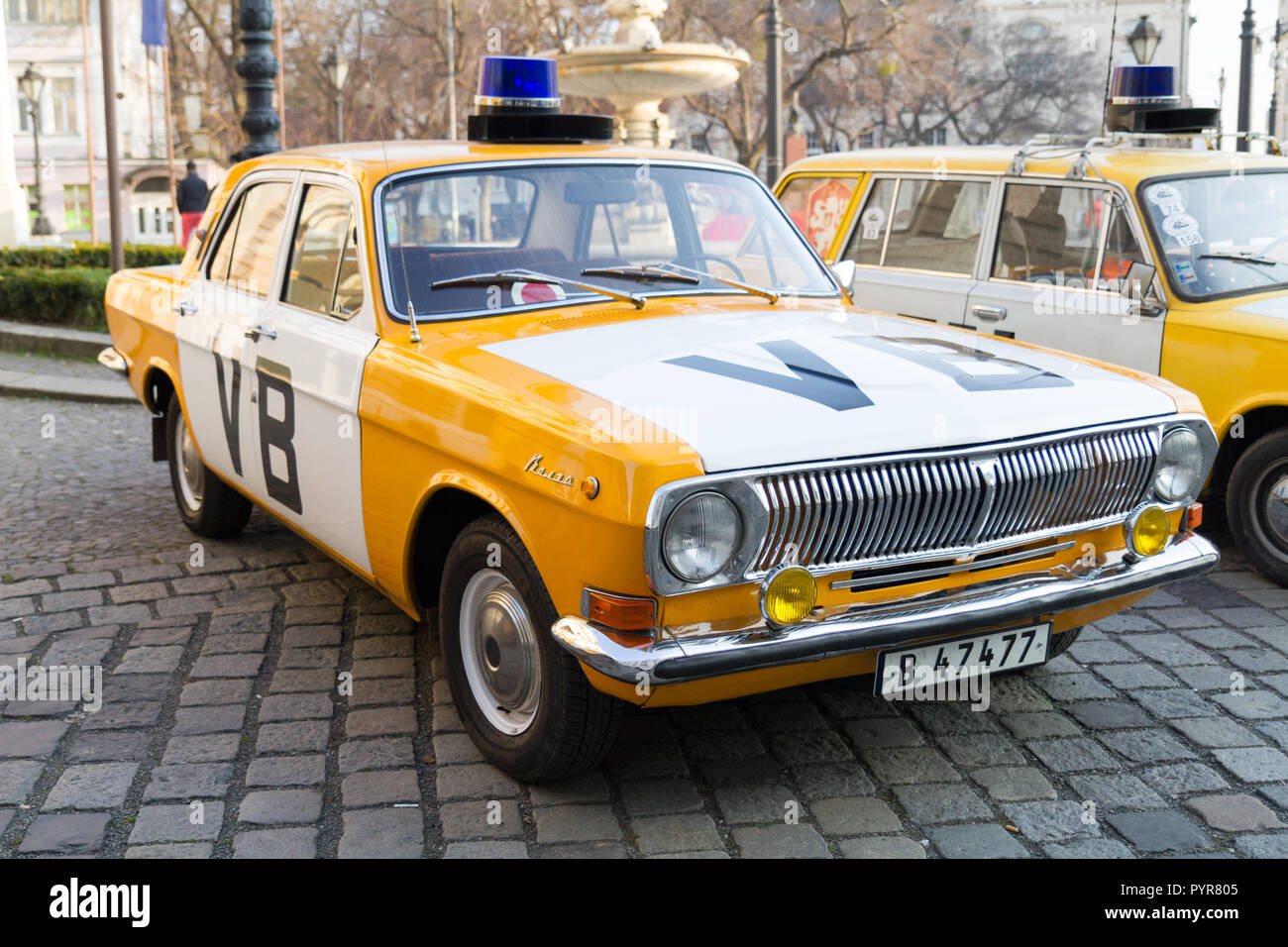 A re-enactment of the Candle manifestation of 1988/3/25 with the notorious 'VB' (Verejna bezpecnost) communist police cars and policemen. Stock Photo