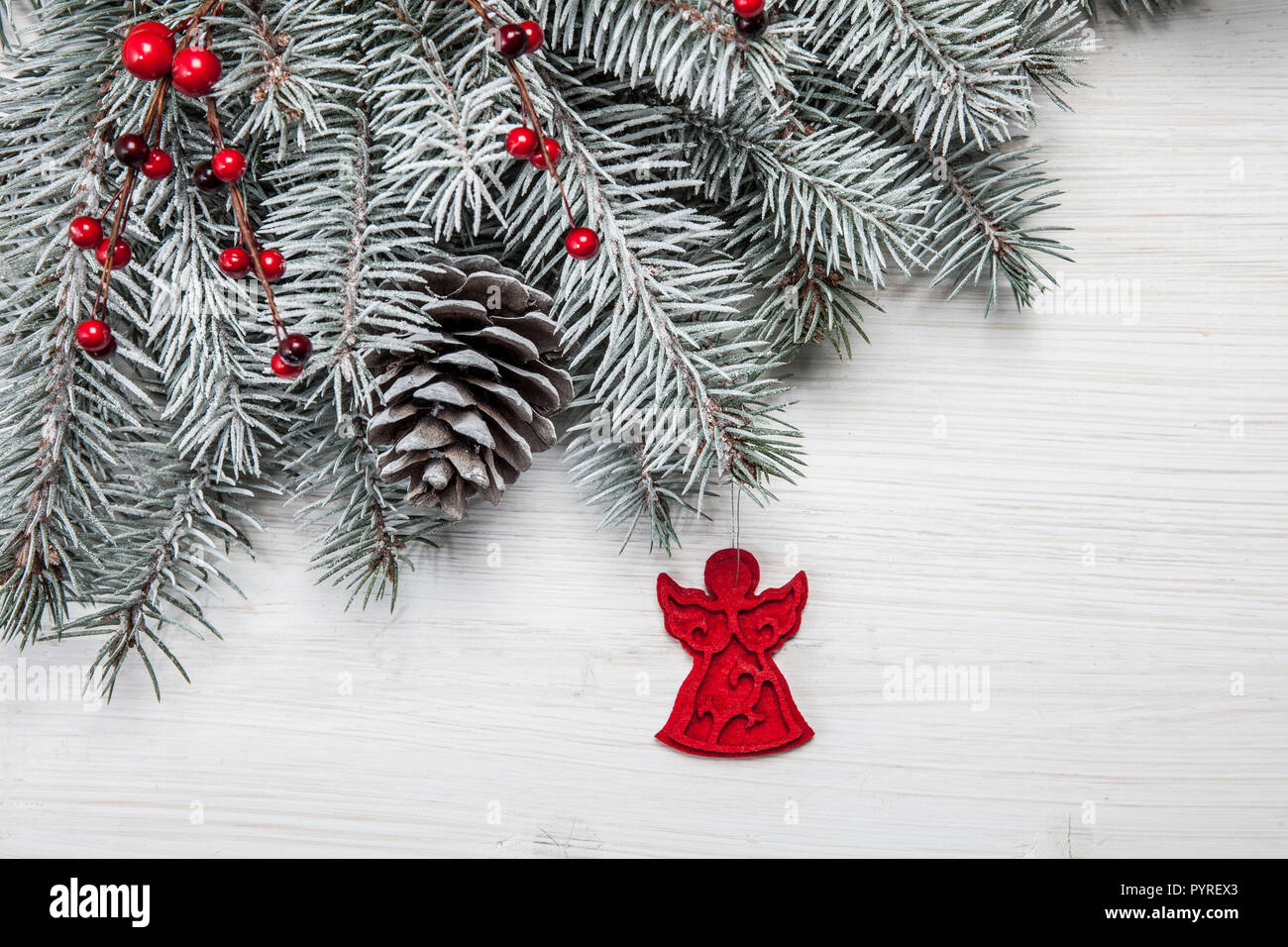 Christmas wooden background with snow fir tree and decoration. Top view ...