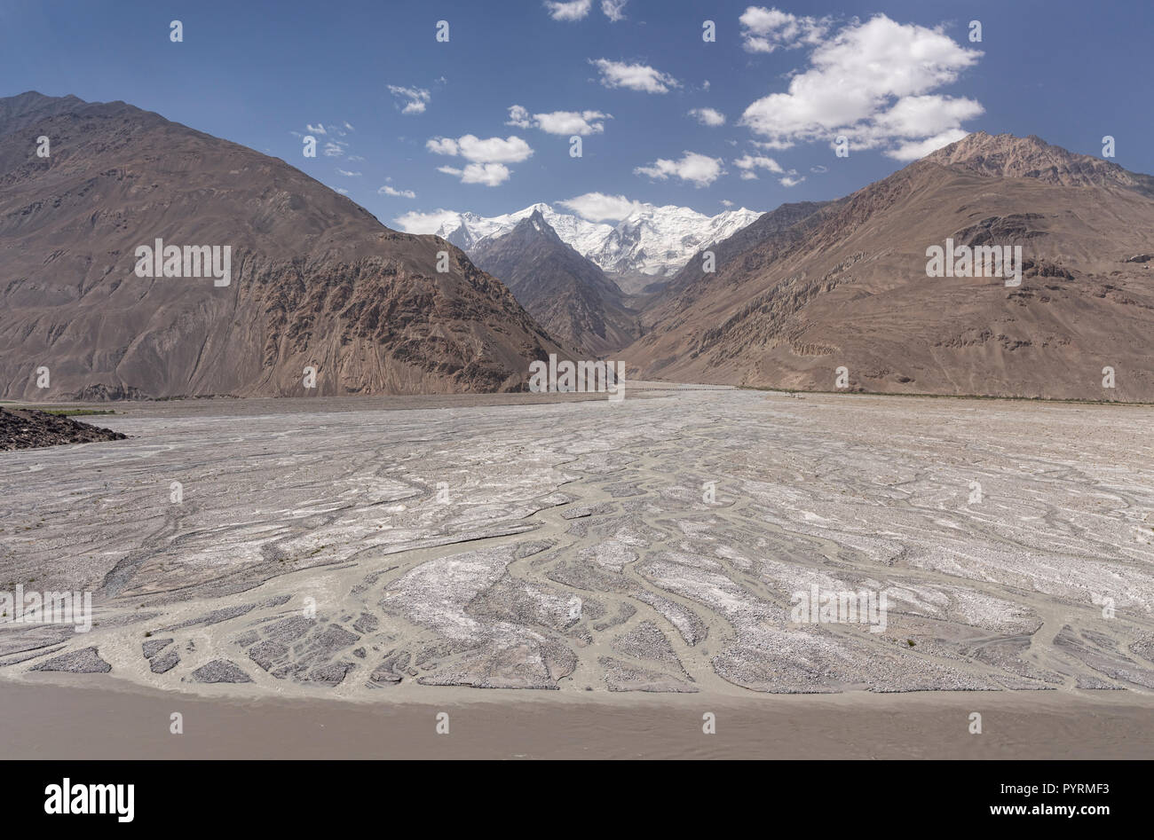 Alluvial fan formed by sediment from glaciers spilling off Kohe Hevad mountain, Wakhan Valley, Afghanistan Stock Photo