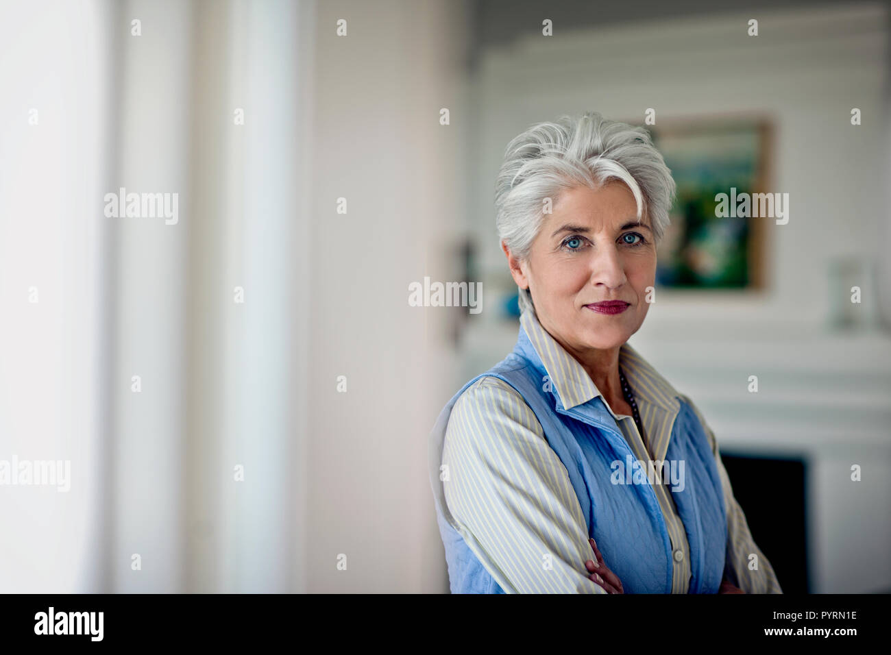 Portrait of a contented mature woman in her home. Stock Photo