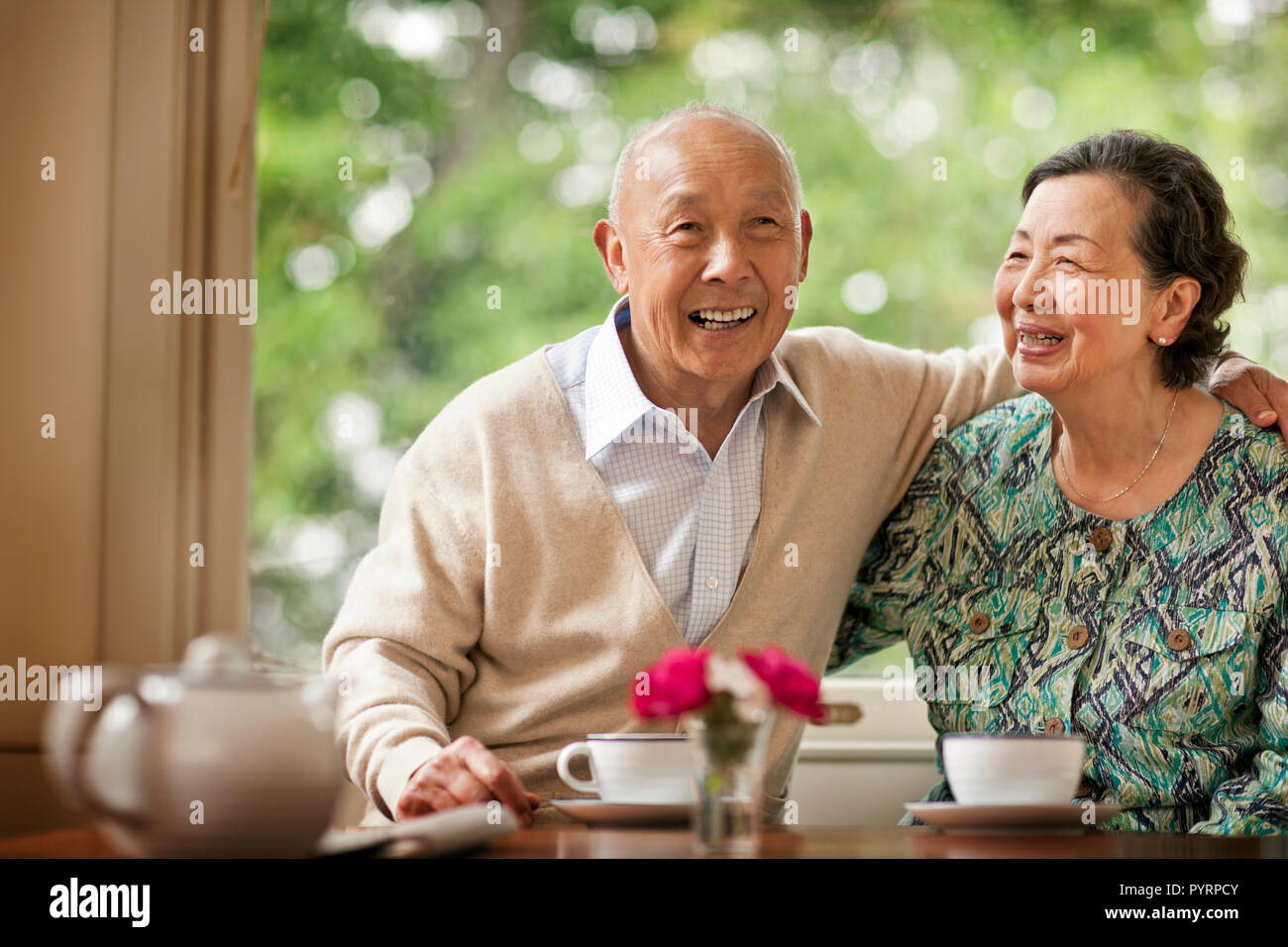 Happy senior couple inside their home. Stock Photo
