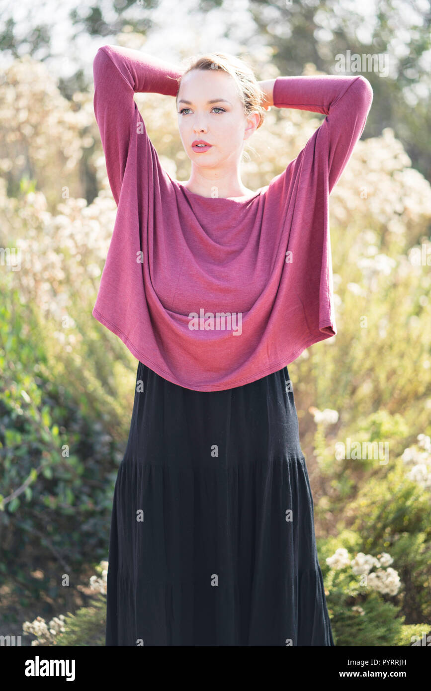 maroon top and black skirt