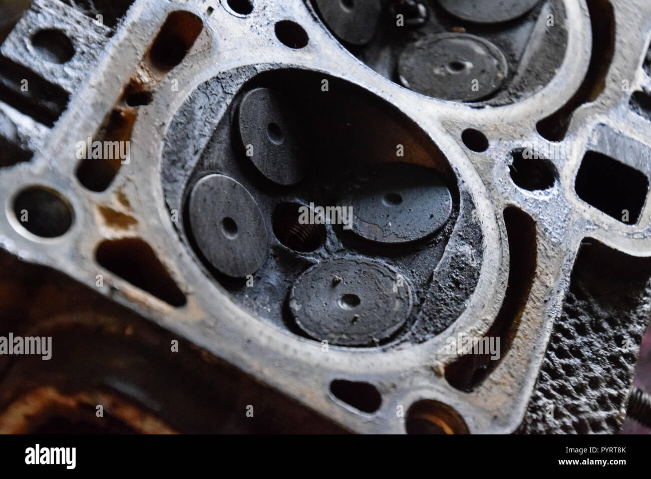 Valve in a deposit on the removed cover of the engine valve box Stock
