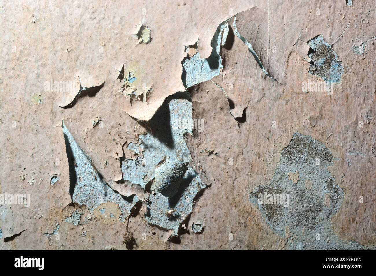 close up background and texture of peeling paint on pastering wall because moisture of water Stock Photo
