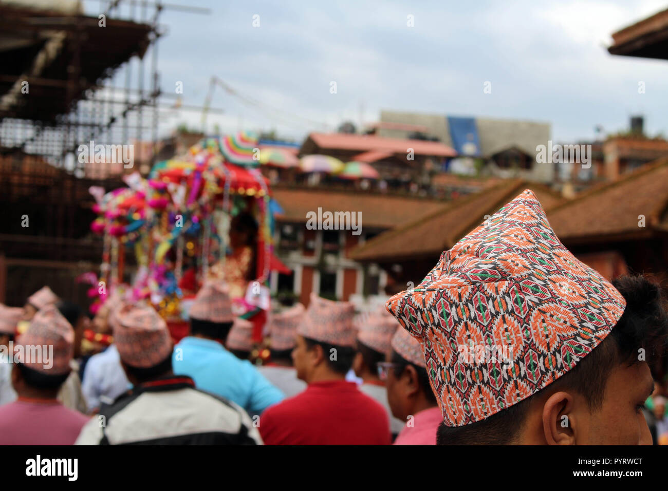 The 'Dhaka Topi' worn by local Nepali people who are having a festival around Patan Durbar Square. Taken in Nepal, September 2018 Stock Photo