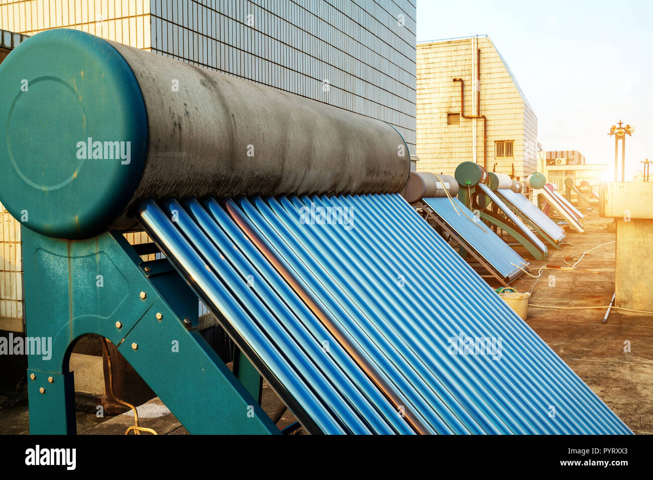 Solar water heater installed on a roof Stock Photo Alamy
