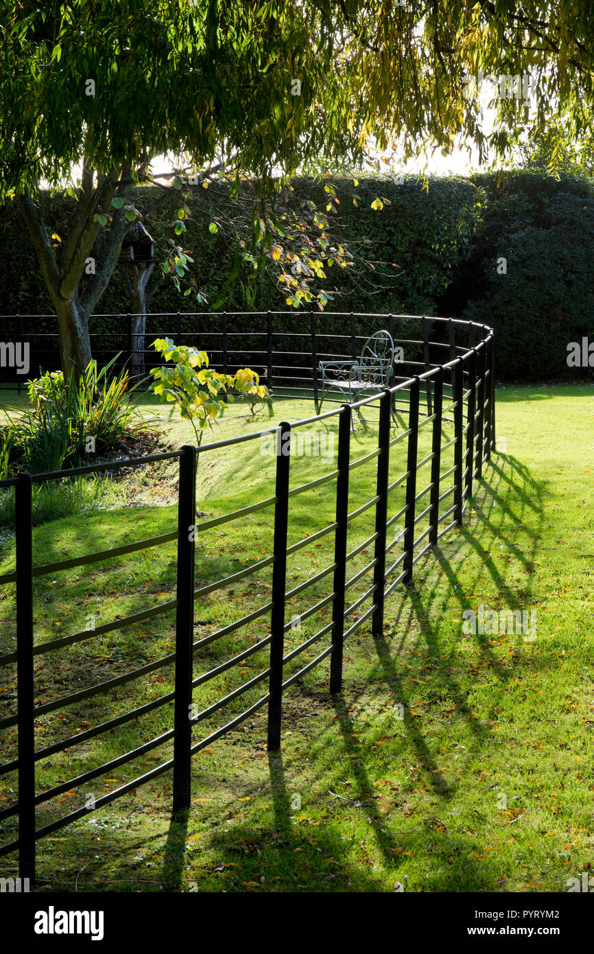 metal fencing in English Garden,England,Europe Stock Photo