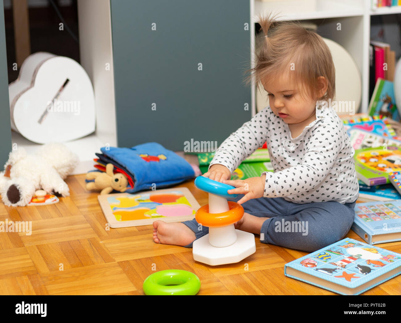 baby girl playing toys