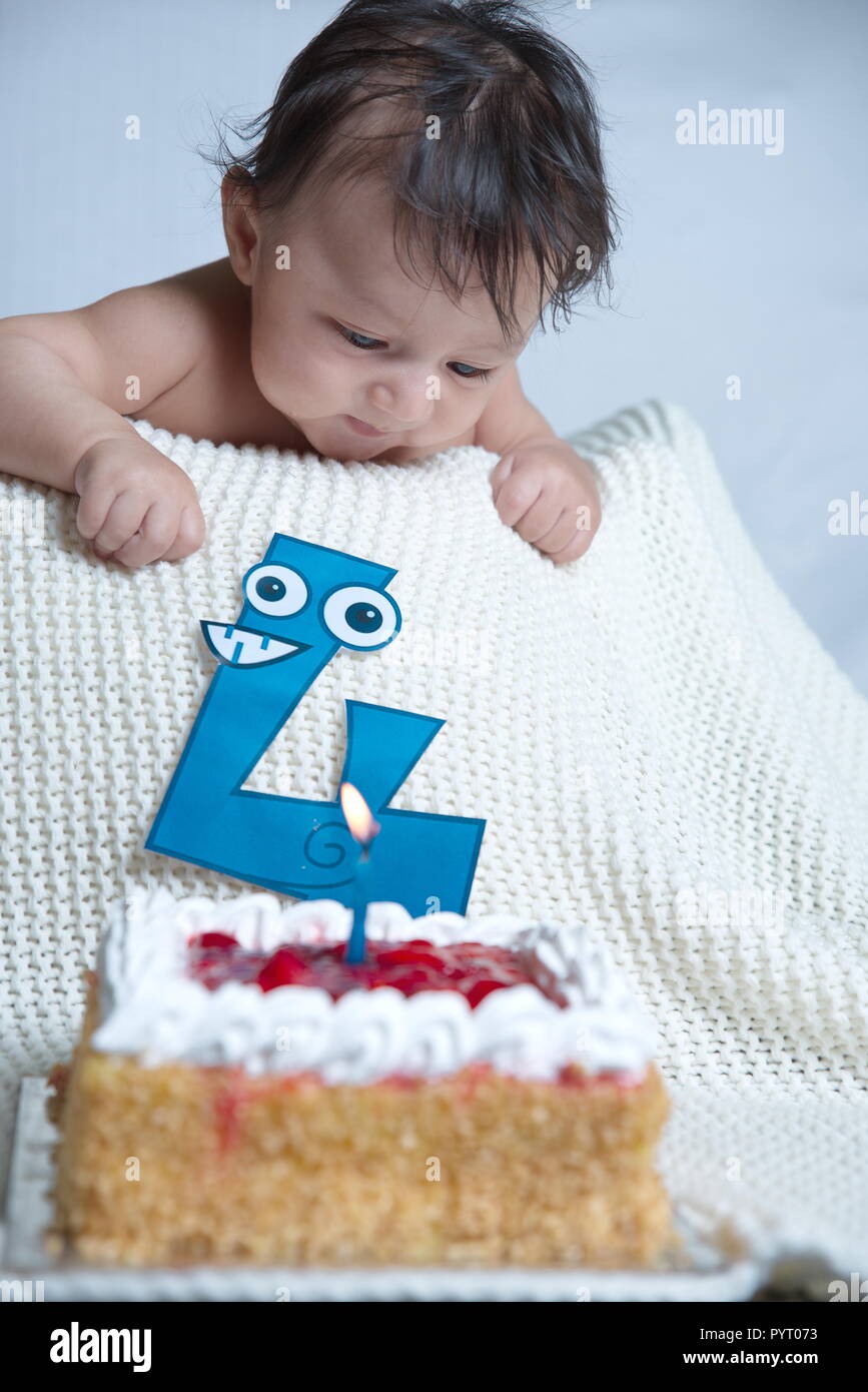 Cute Little Four Month Old Baby In The Basket With White Background On A Fluffy Blanket Stock Photo Alamy