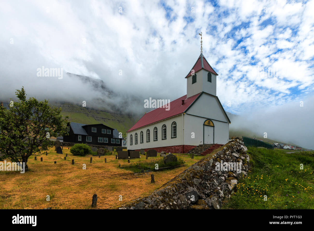 Church and cemetery, Kunoy, Kunoy island, Faroe Islands, Denmark Stock Photo