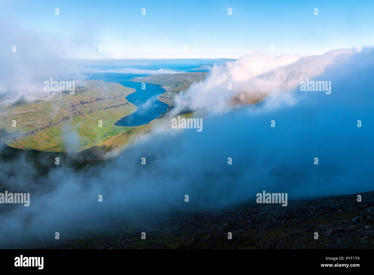 Clouds on hills above Kaldbakfjord, Streymoy island, Faroe Islands, Denmark Stock Photo