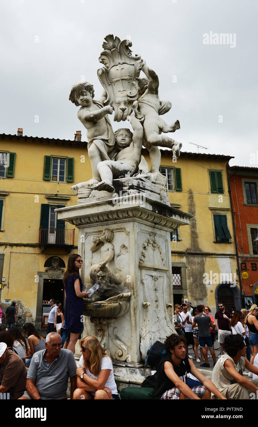 The Three angles statue and fountain in Pisa, Italy. Stock Photo