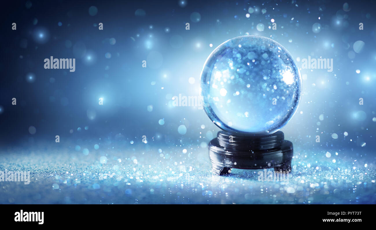 Snow Globe Sparkling In Shiny Background Stock Photo
