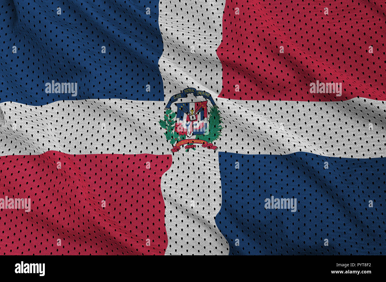 Dominican Republic flag printed on a polyester nylon sportswear mesh fabric with some folds Stock Photo
