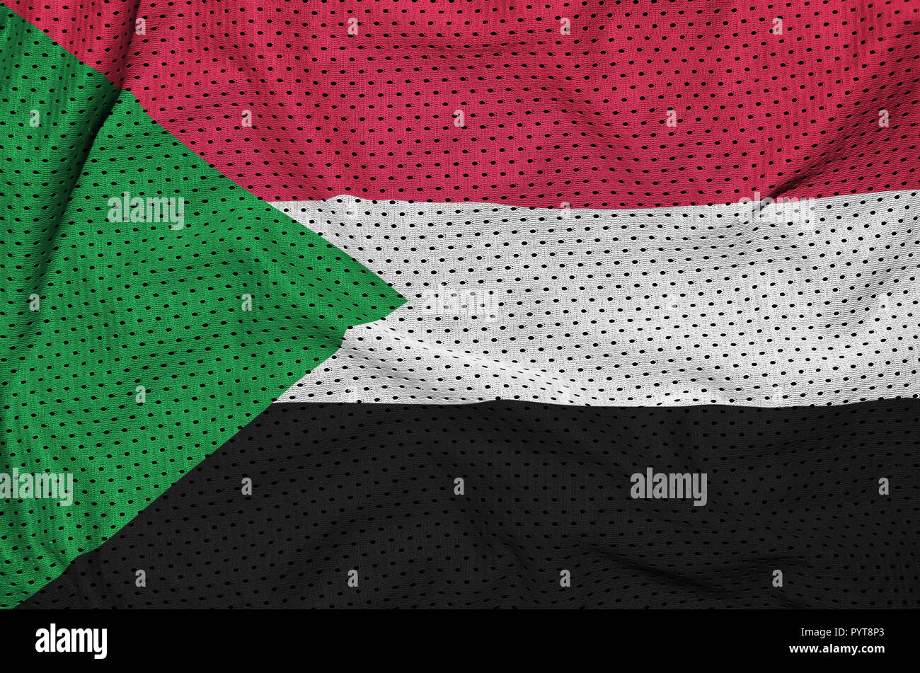 Sudan flag printed on a polyester nylon sportswear mesh fabric with some folds Stock Photo