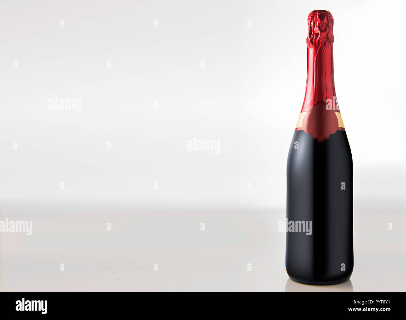 Bottle of wine isolated over white background Stock Photo - Alamy