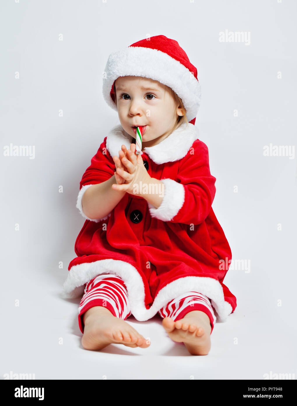 Funny child in santa hat , Christmas portrait Stock Photo