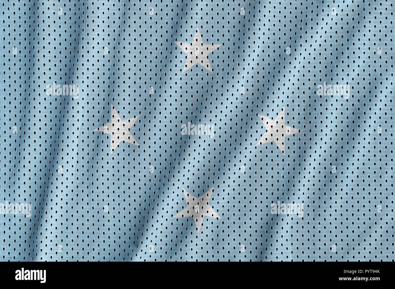 Micronesia flag printed on a polyester nylon sportswear mesh fabric with  some folds Stock Photo - Alamy