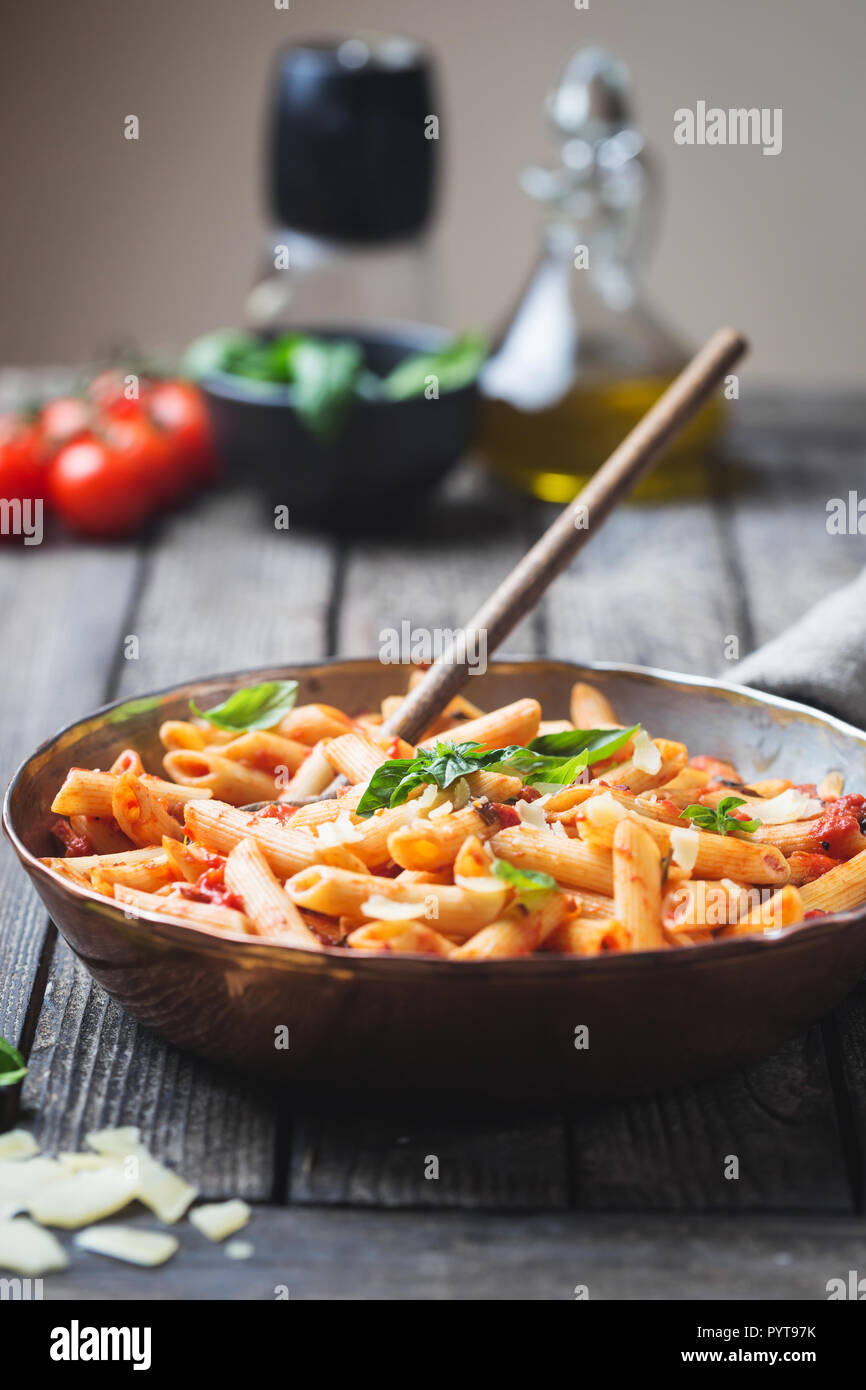Penne pasta in tomato sauce Stock Photo - Alamy