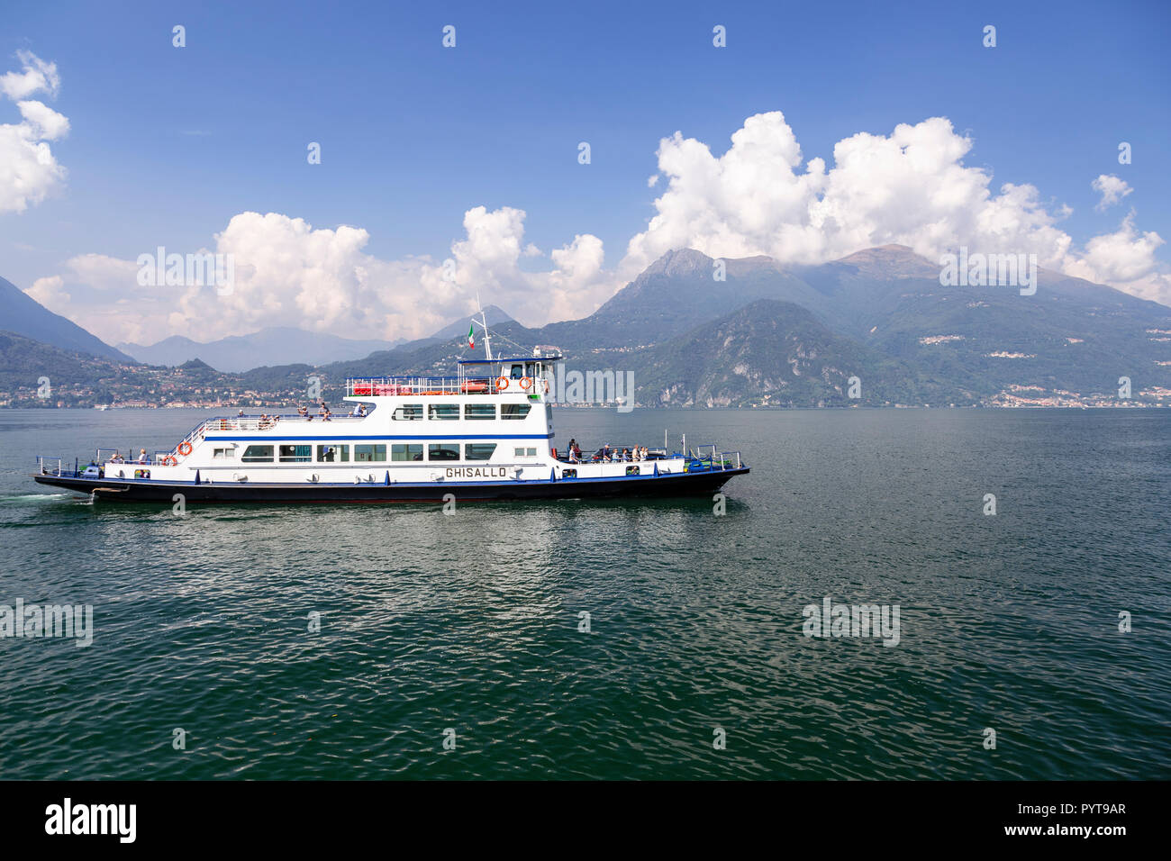 Ferry approaching the harbour at Varenna on Lake Como, Italy Stock Photo