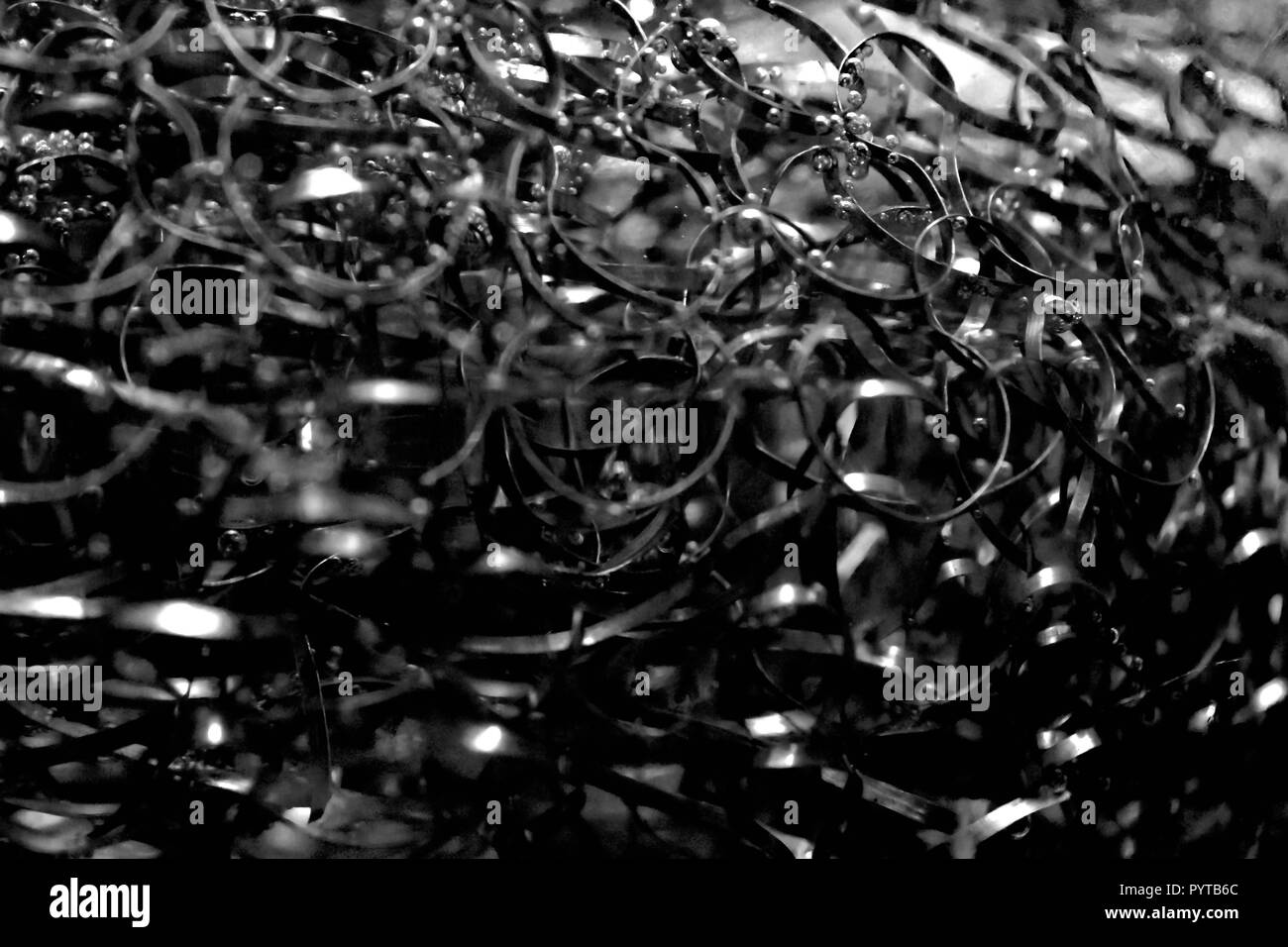 Macro Shot Of Cleaning Steel Wool, Sponge Steel Under Water With Air Bubbles. Stock Photo