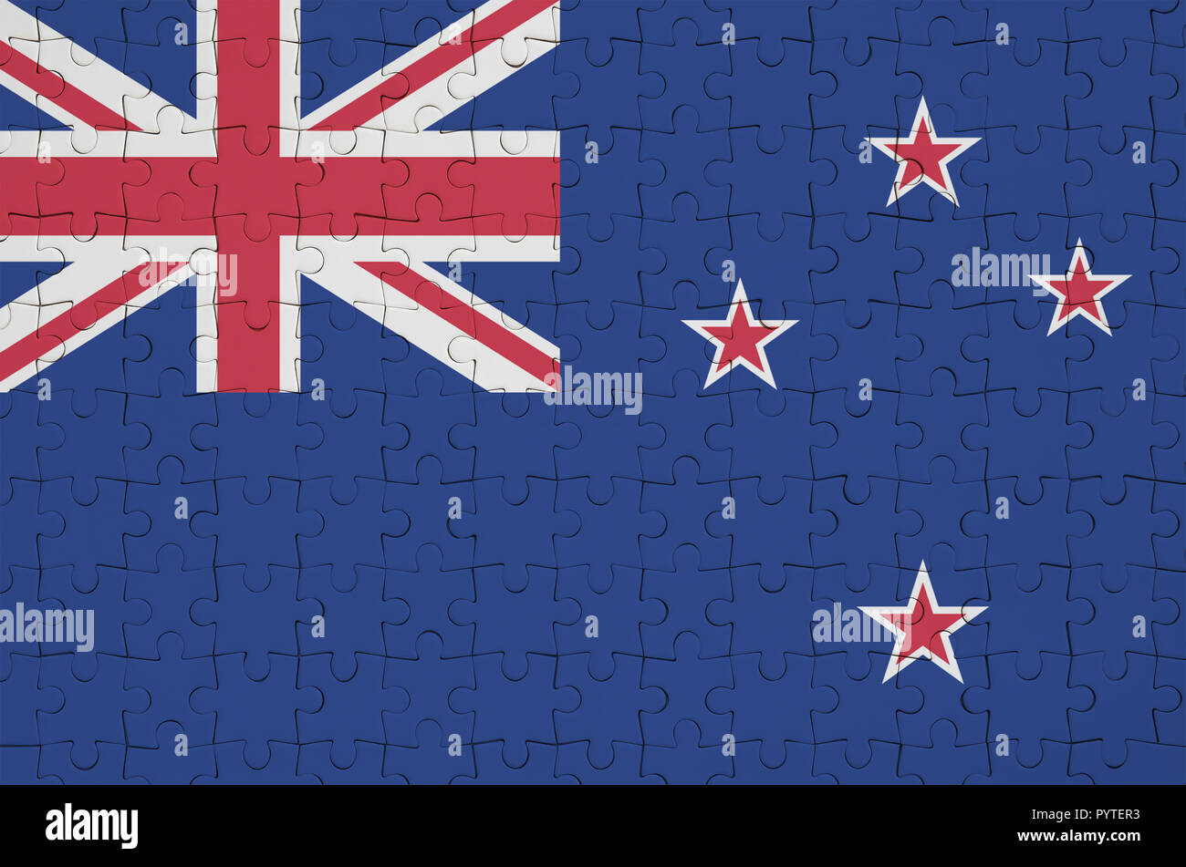 New Zealand flag  is depicted on a folded puzzle Stock Photo