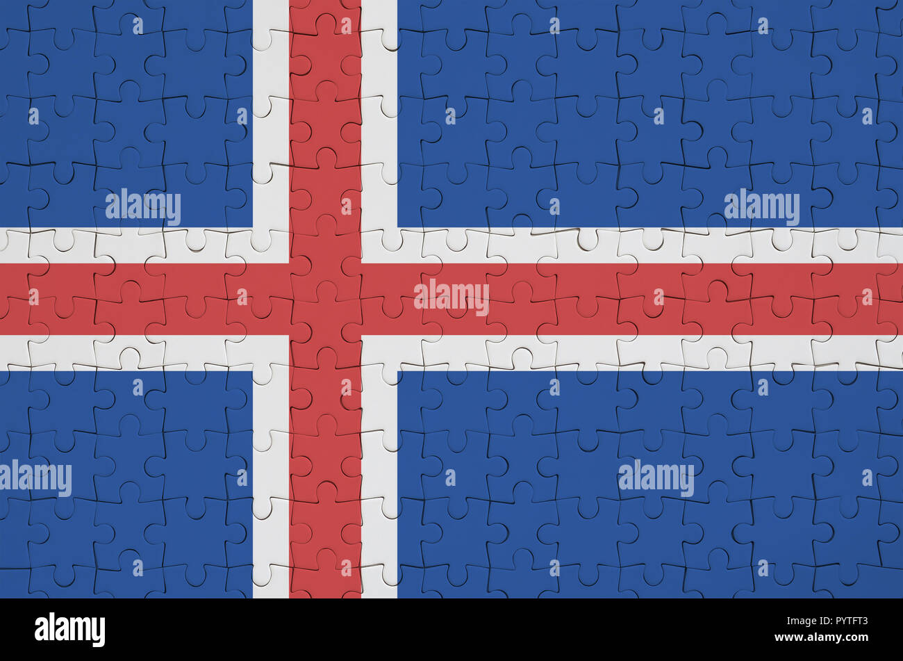 Iceland flag is depicted on a folded puzzle Stock Photo - Alamy
