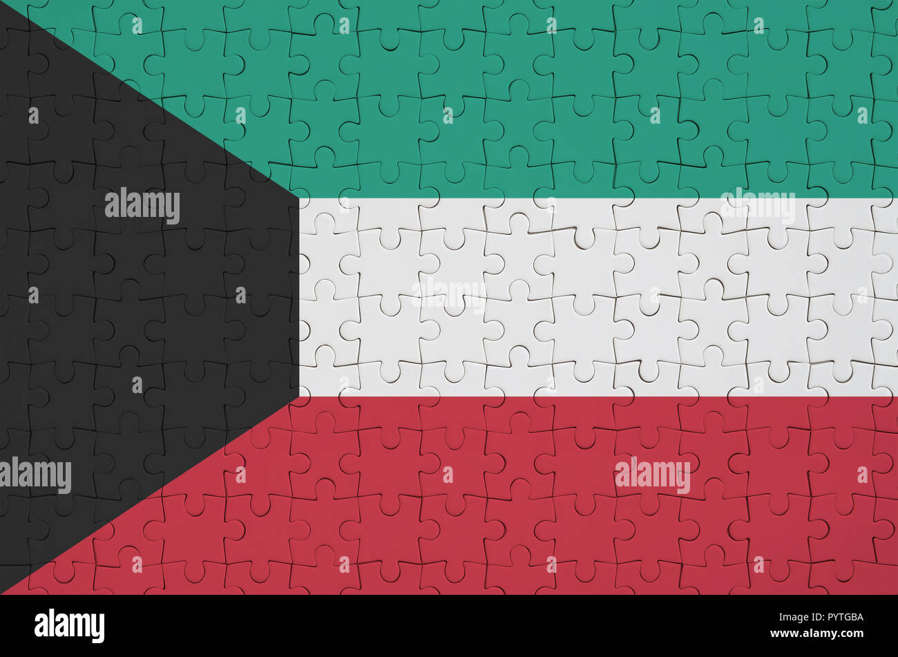 Kuwait flag is depicted on a puzzle hi-res stock photography and images ...