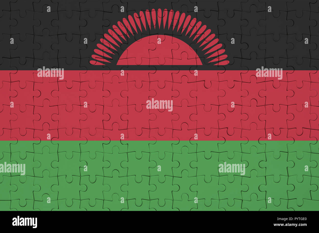 Malawi flag is depicted on a folded puzzle Stock Photo - Alamy
