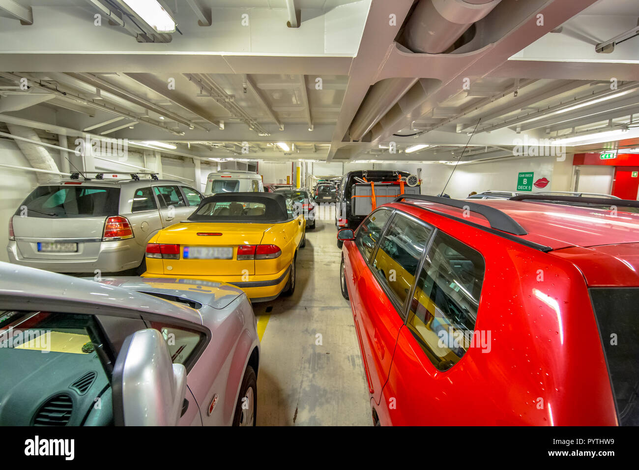 Passenger cars in the interior of marine ferry in Europe Stock Photo
