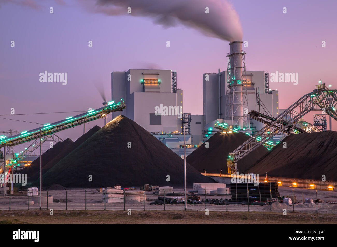 Coal used to play a vital role in electricity generation worldwide. Altough modern plants are much more efficient than before, it is a very polluting  Stock Photo