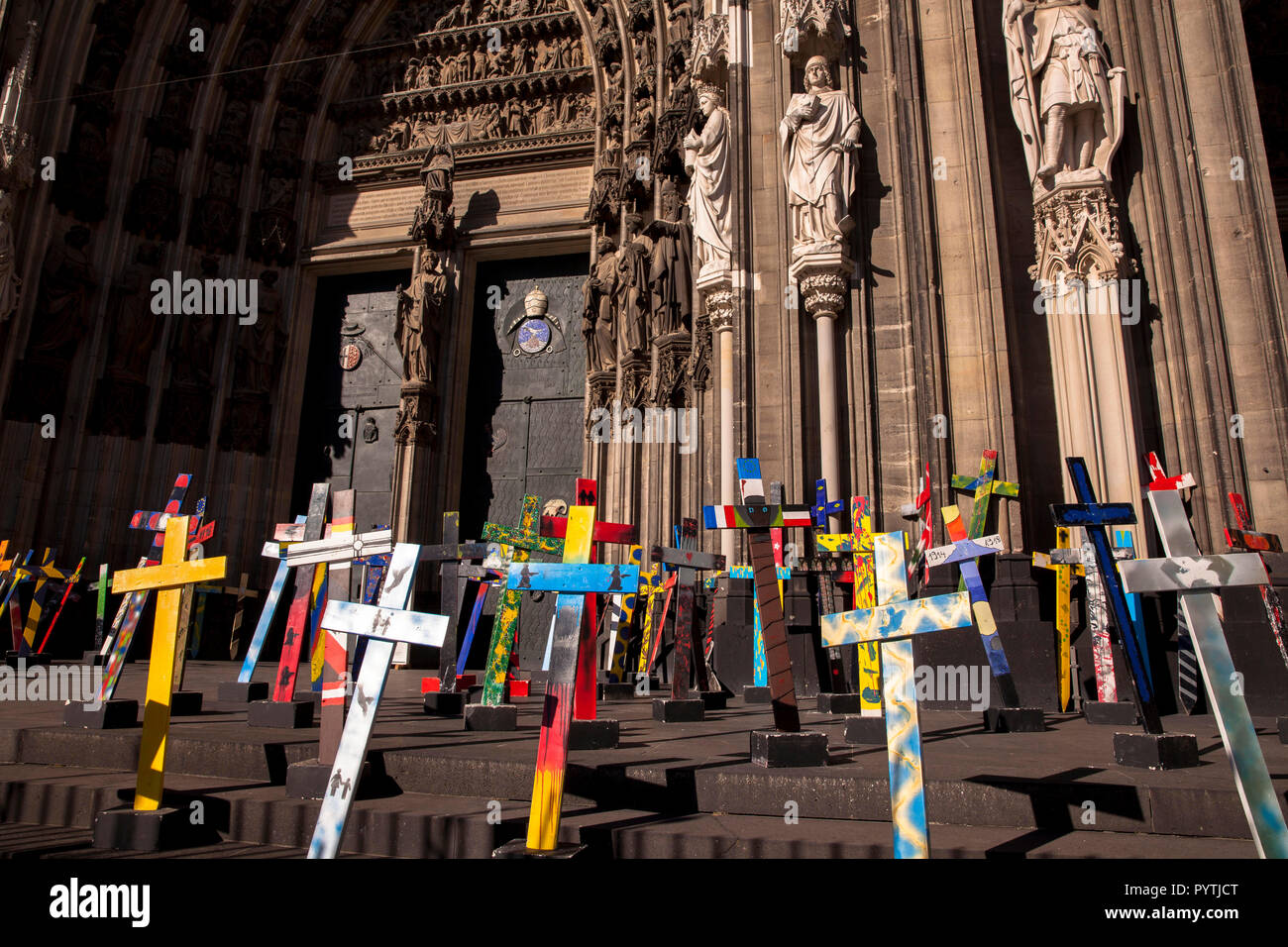 so-called Europe crosses, which students have made, standing in front of the south portal of the cathedral during the cathedral pilgrimage 2018 , Colo Stock Photo