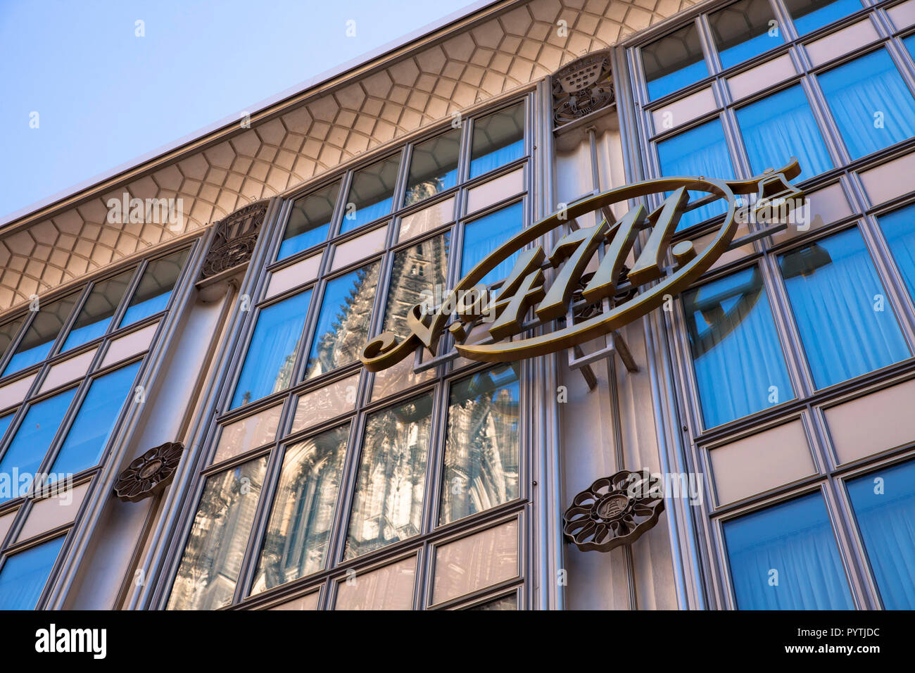 the cathedral is reflected in the facade of the Blau-Gold house, Cologne, Germany.  der Dom spiegelt sich in der Fassade des Blau-Gold-Hauses, Koeln,  Stock Photo