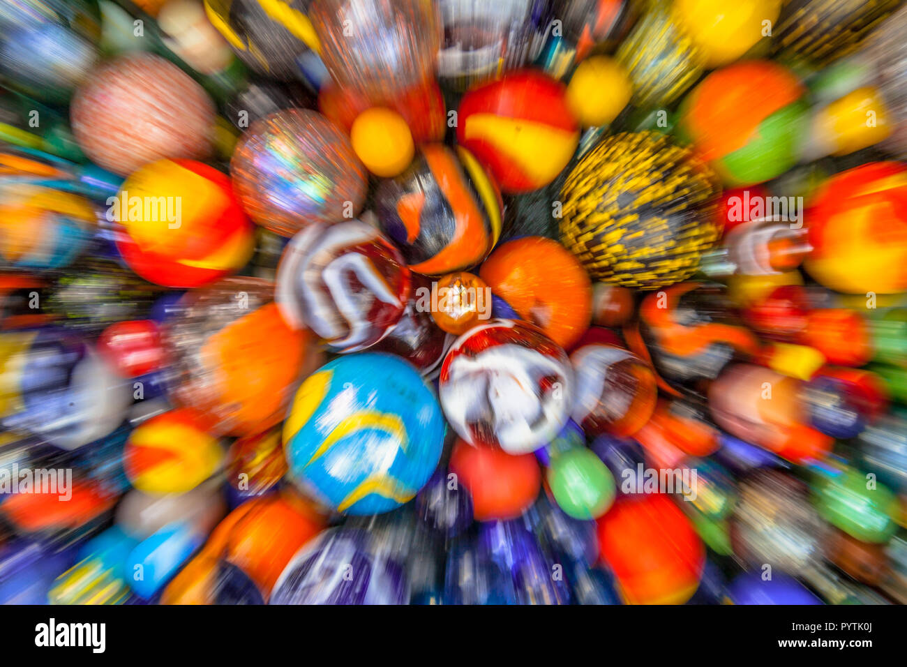 Background of colorful glass marbles as a concept for diversity, zoomed in during exposure Stock Photo