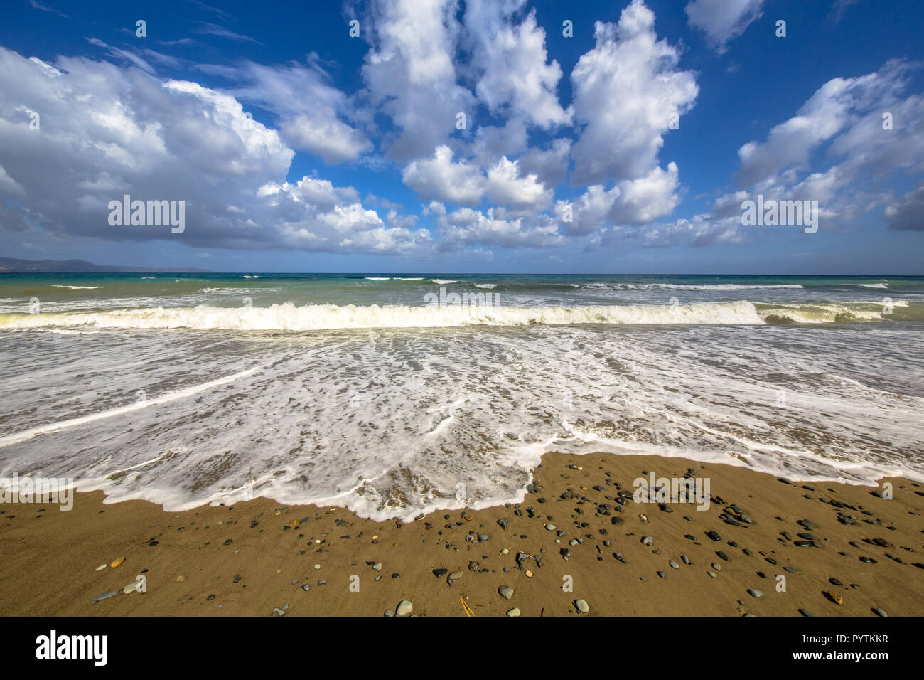 View of mediterranean beach with stones on Cyprus island near the village of Polis Stock Photo