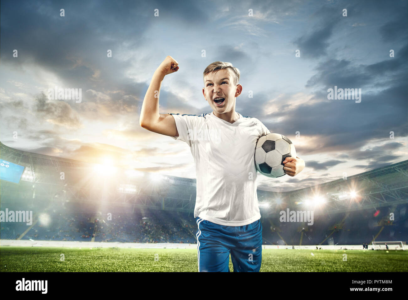 Football Soccer Player is Number One in a Stadium Background Stock