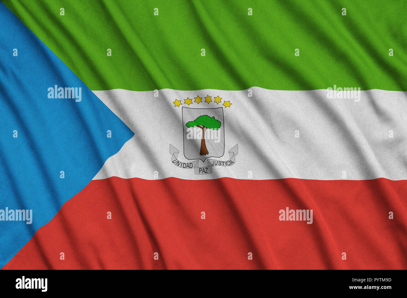 Equatorial Guinea flag  is depicted on a sports cloth fabric with many folds. Sport team waving banner Stock Photo