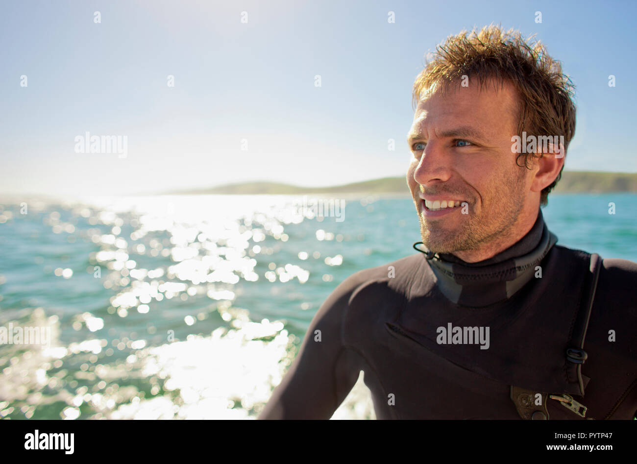 Portrait of a surfer in the water. Stock Photo