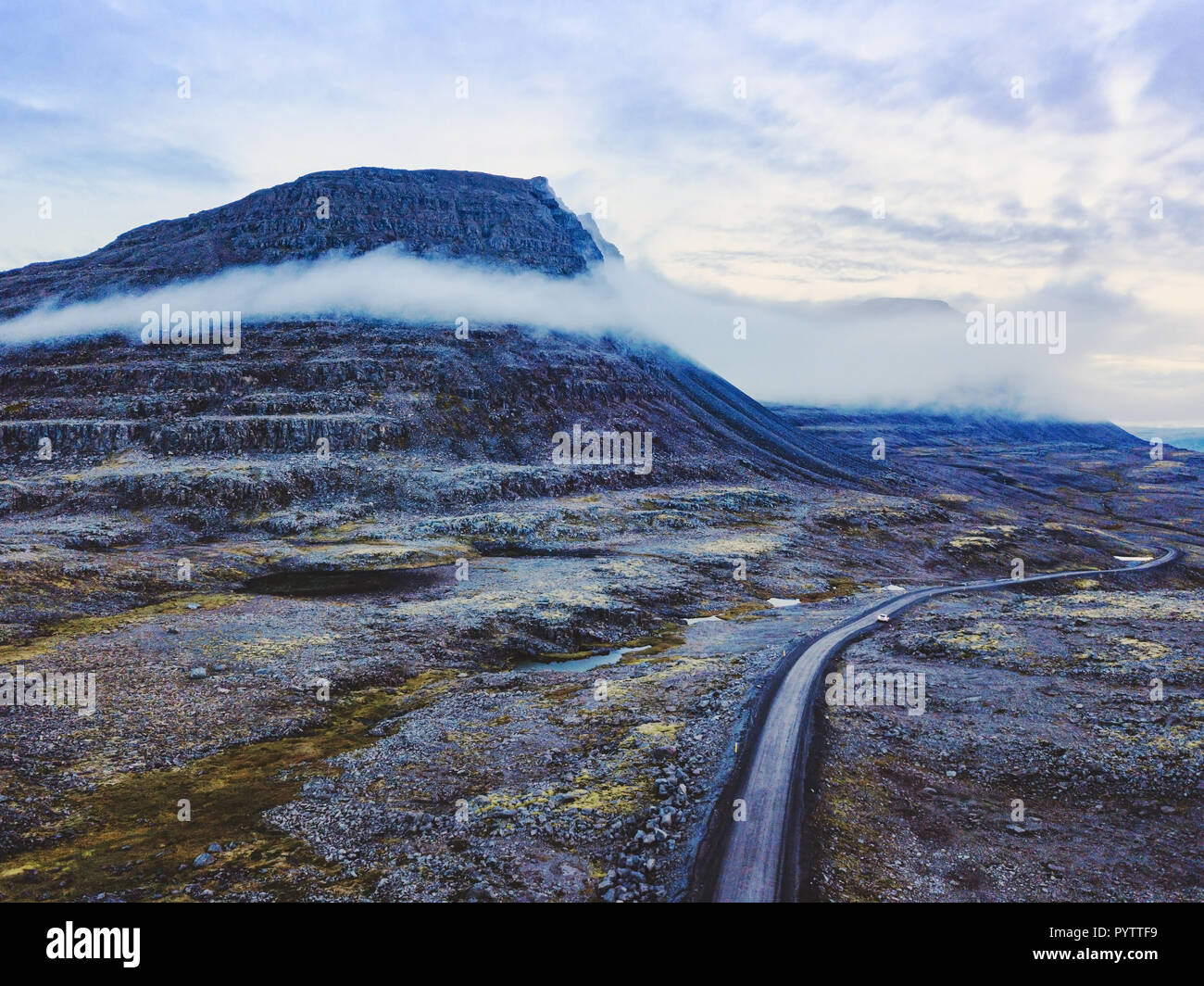 beautiful scenic road in mountain landscape, travel to fjords in Iceland, roadtrip Stock Photo